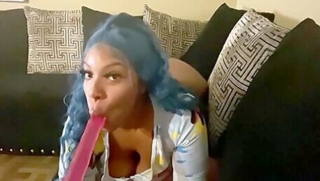 Ebony With Blue Hair Having Fun On Couch
