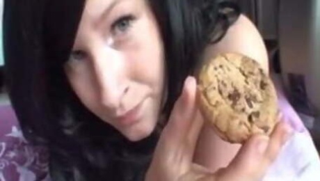 Nasty busty slut eats cum load off a cookie